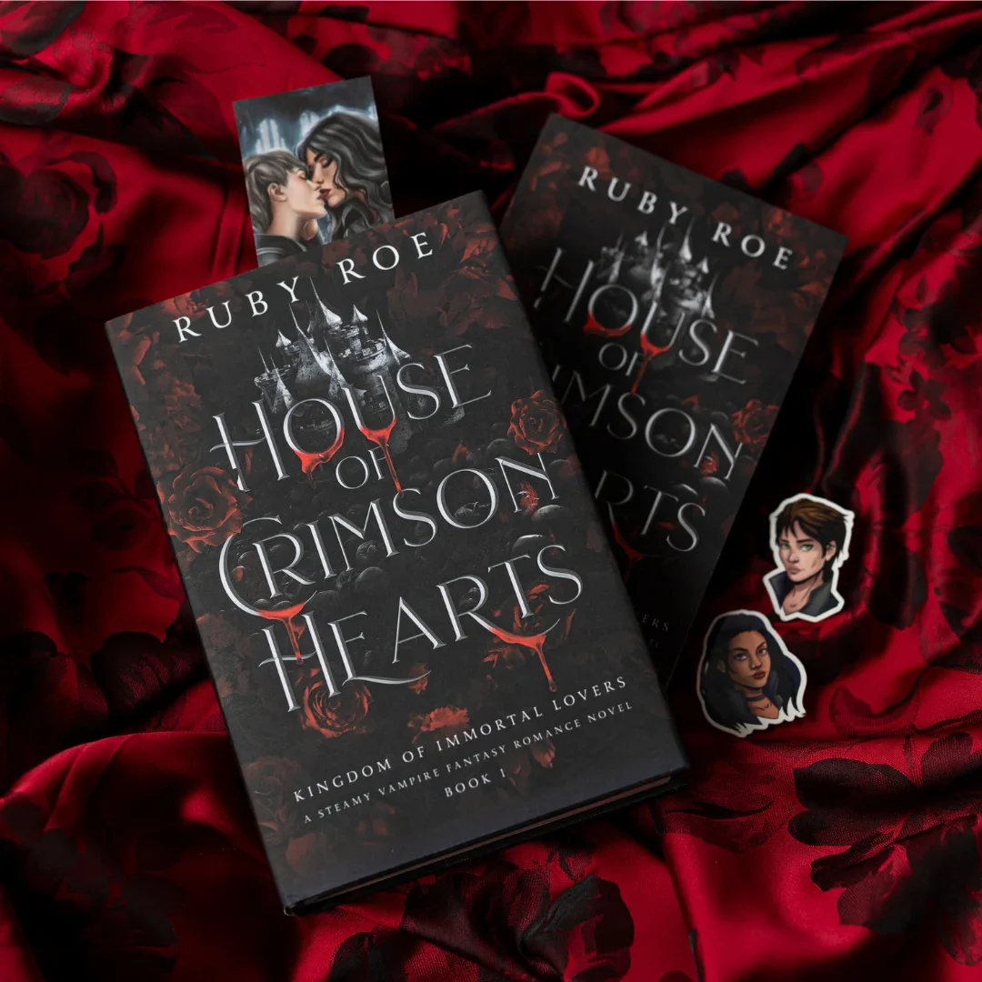 House of Crimson Hearts by Ruby Roe photographed on red fabric with character artwork